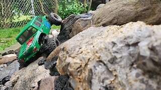 Pinched SCX24 Gladiator out on the rocks at home(new to the channel)