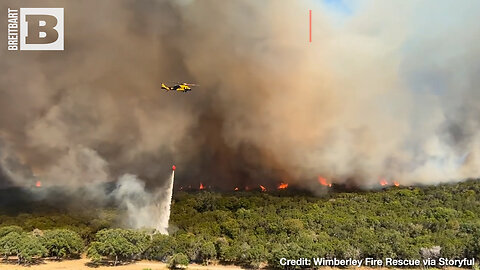 AERIAL EXTINGUISH! Footage Shows Helicopter SMOTHERING WILDFIRE South of Austin