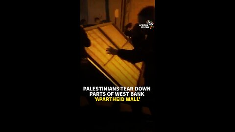 PALESTINIANS TEAR DOWN PARTS OF WEST BANK ‘APARTHEID WALL’