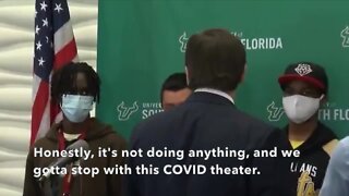 Florida governor appears to scold students over masks