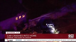 Driver taken to hospital after crashing into Chandler home