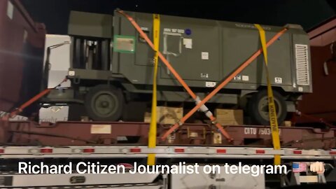 Journalist Films a Truck Stop That Have Big Rigs Parked Loaded With Military Equipment - 2527