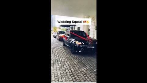 Wedding squad with expensive cars