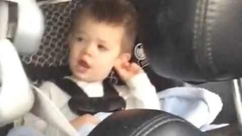 2 year old boy with the sweetest voice singing in the back seat