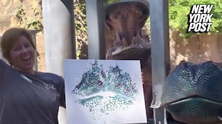 Hippos making art gets 'stamp' of approval