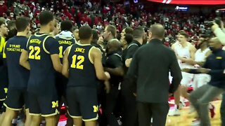 Michigan coach Howard hits Wisconsin assistant after a loss