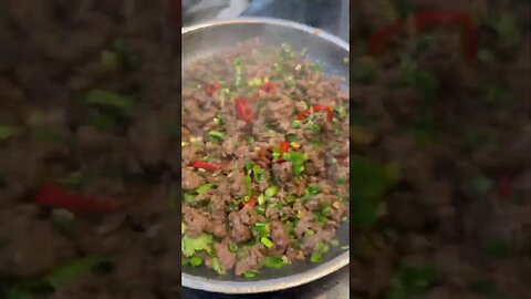 Chile beef/bison with ginger, garlic, cilantro, lime and more. So good. Served on lettuce wraps.