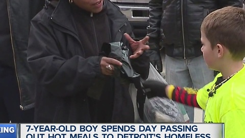 Boy spends day giving out food to homeless