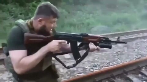 Chechen soldier for Russia WILDLY firing AK 47!