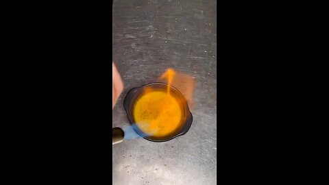 Torching Creme Brûlée (burnt cream)