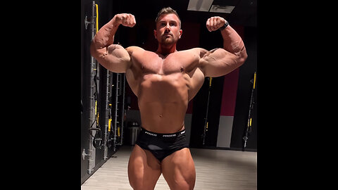 Young and Massive - bodybuilder posing