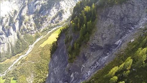 Intense BASE jump footage over stunning terrain