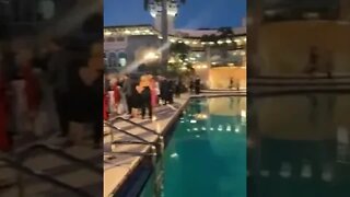 MAR-A-LAGO HERSCHEL WALKER event 12-1-21 large crowd poolside at President Trumps fundraiser.