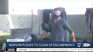 Governor cleans up encampment