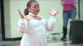 Parade victim dances for first time since attack