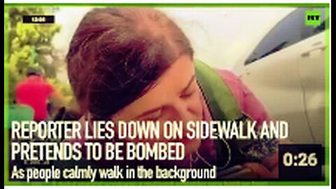 Reporter lies down on sidewalk and pretends to be bombed