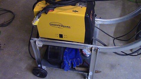 Homemade welding cart using garage door rails