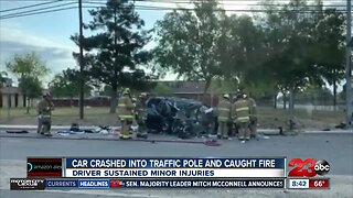 Car crashes into traffic pole, catches fire in East Bakersfield