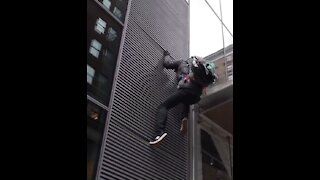 Left Wing Protestor FALLS While Trying to Climb NYC Building