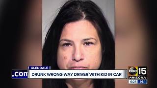 Woman accused of driving drunk the wrong way with child in car