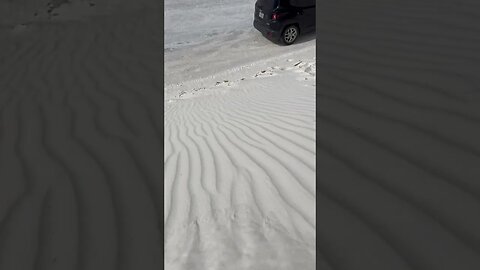 Sledding down White Sands National Park