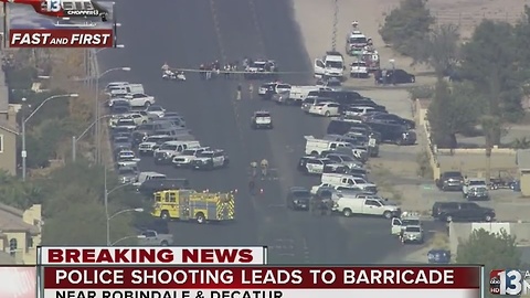 UPDATE: Suspect in custody after barricade, shooting at police