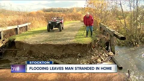 Flooding leaves man stranded in home