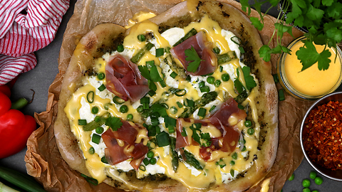 Spring pizza with asparagus and wild garlic