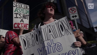 Abolish ICE Activists Bring Makeshift Guillotine To Protest, Depict Trump Beheading