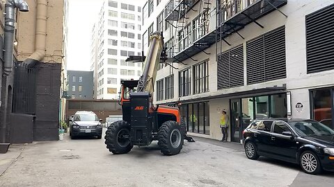 Stocking material with JLG 1075 to the 6th floor!