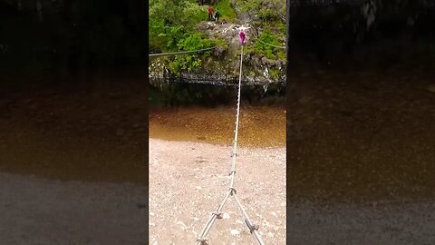 Crossing the Rope Bridge Steall Falls Glen Nevis Scotland