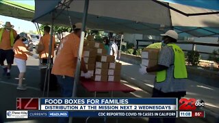 The Mission distributes food boxes for families