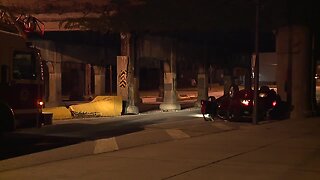 Driver hospitalized after car crashes into Superior Bridge