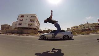 Daredevils pull off high-flying stunts with speeding cars