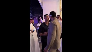 Cristiano Ronaldo greets Rio Ferdinand