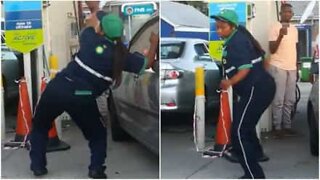 Drunk gas station attendant puts on dance show