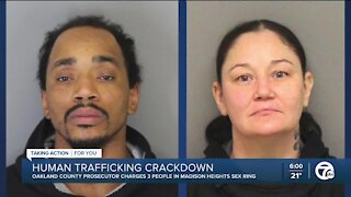 Two charged, one sought in Oakland County human trafficking case