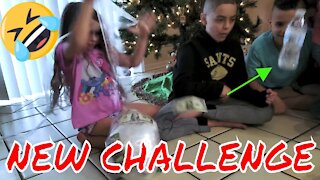 Saran wrap Gift ball Bottle Flip Challenge!