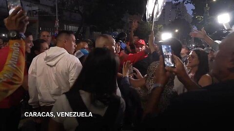 Maduro's supporters and opposition shout at each other on Venezuela's election day