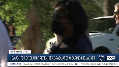 Daughter of slain firefighter graduates wearing his jacket