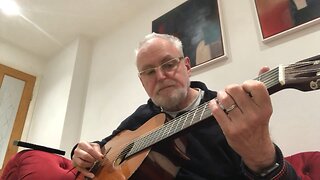 Playing a classical guitar with a reesha or oud pick 5