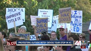Groups protest outside Betsy DeVos school visit