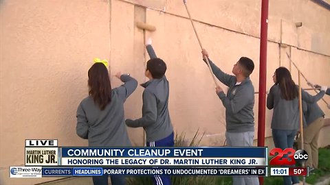 Family volunteers during Lamont's MLK Day Clean-Up
