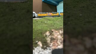 N Scale Coal train struggling up a hill