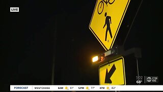 New bill would change mid-block crosswalk lights from yellow to red, but advocates have concerns