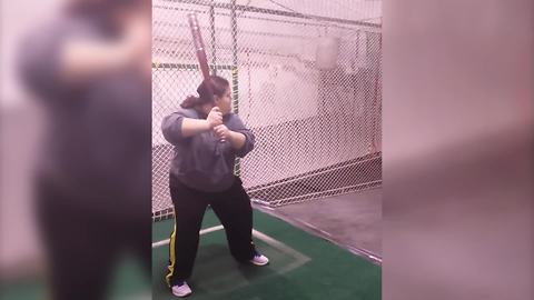 Funny Girl Practices Her Baseball Swings