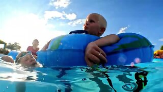 Baby Free Floating in the Wave Pool