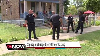 Two charged in tazing of DPD officer