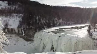 Drone footage of frozen New York waterfall