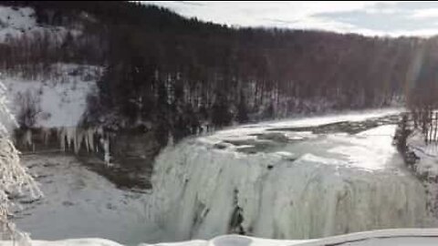 Drone footage of frozen New York waterfall